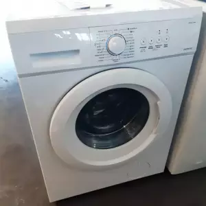 LAVE LINGE HUBLOT 7 kg — OCEANIC